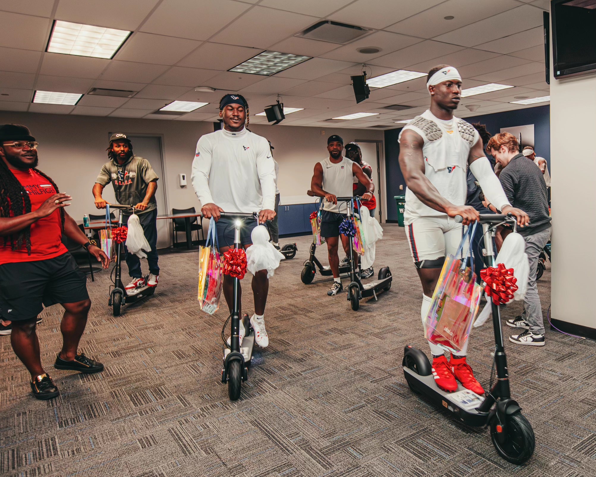 NFL Texans Captain Surprisingly Gifting the team with OKAI Neon Pro